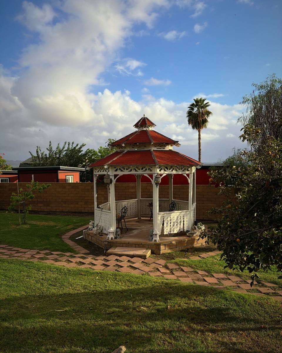 A gazebo under clouds, shot in the Burro look