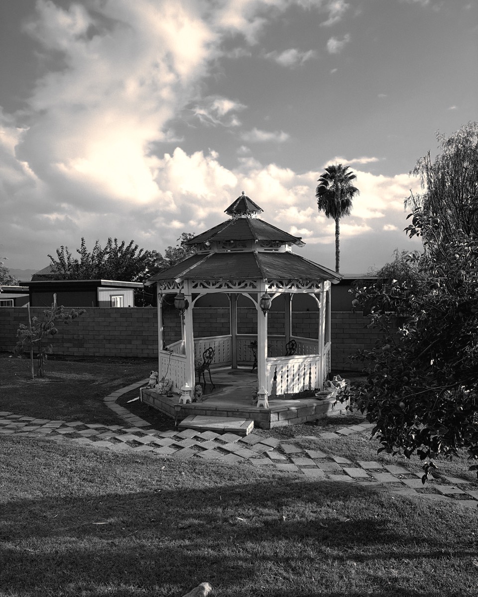 A gazebo under clouds, shot in the Calamaro look
