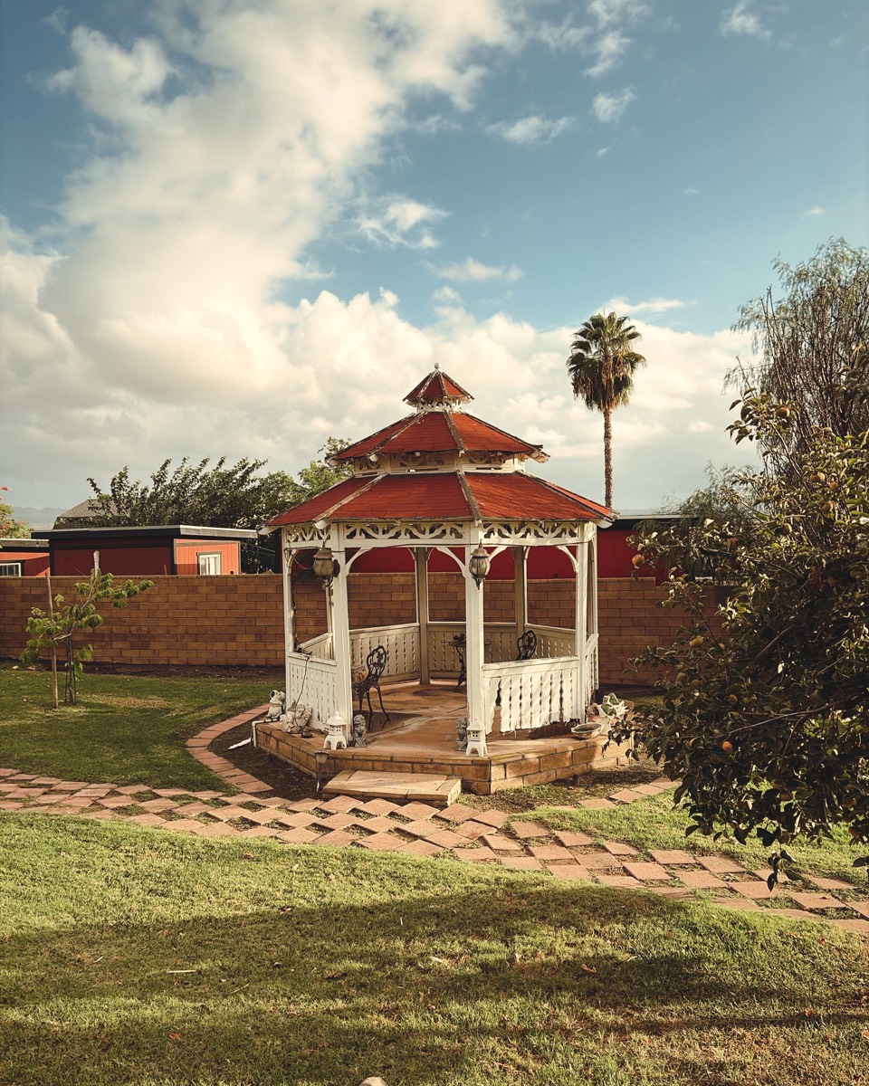 A gazebo under clouds, shot in the Espresso look